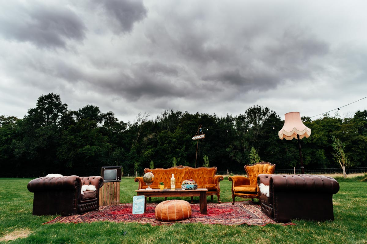 cool retro sofa outside on the grass